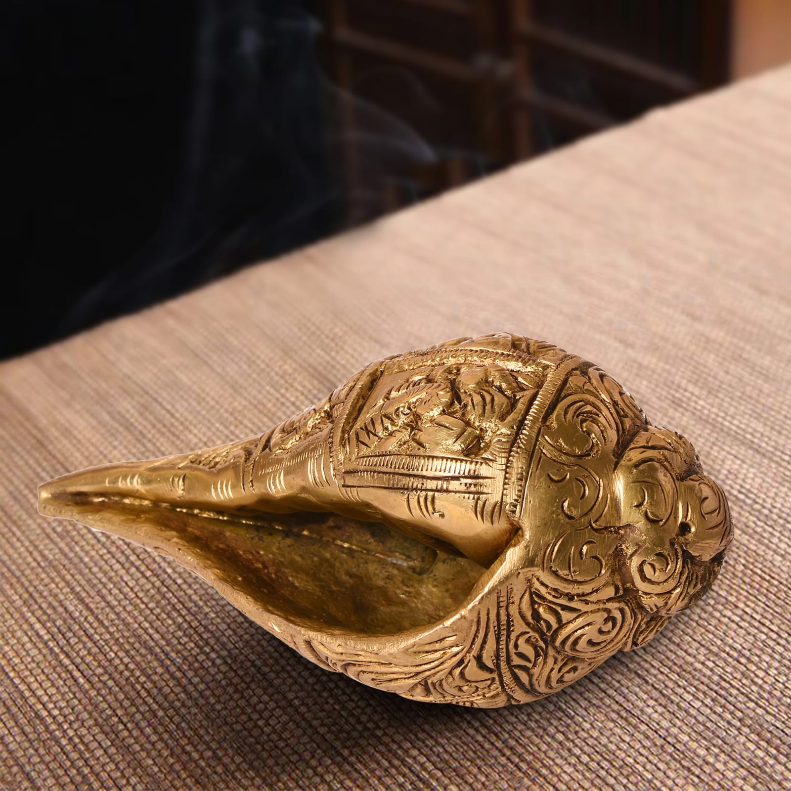 "Handcrafted Brass Shankh with Intricate Carvings – Decorative Sacred Conch Shell"