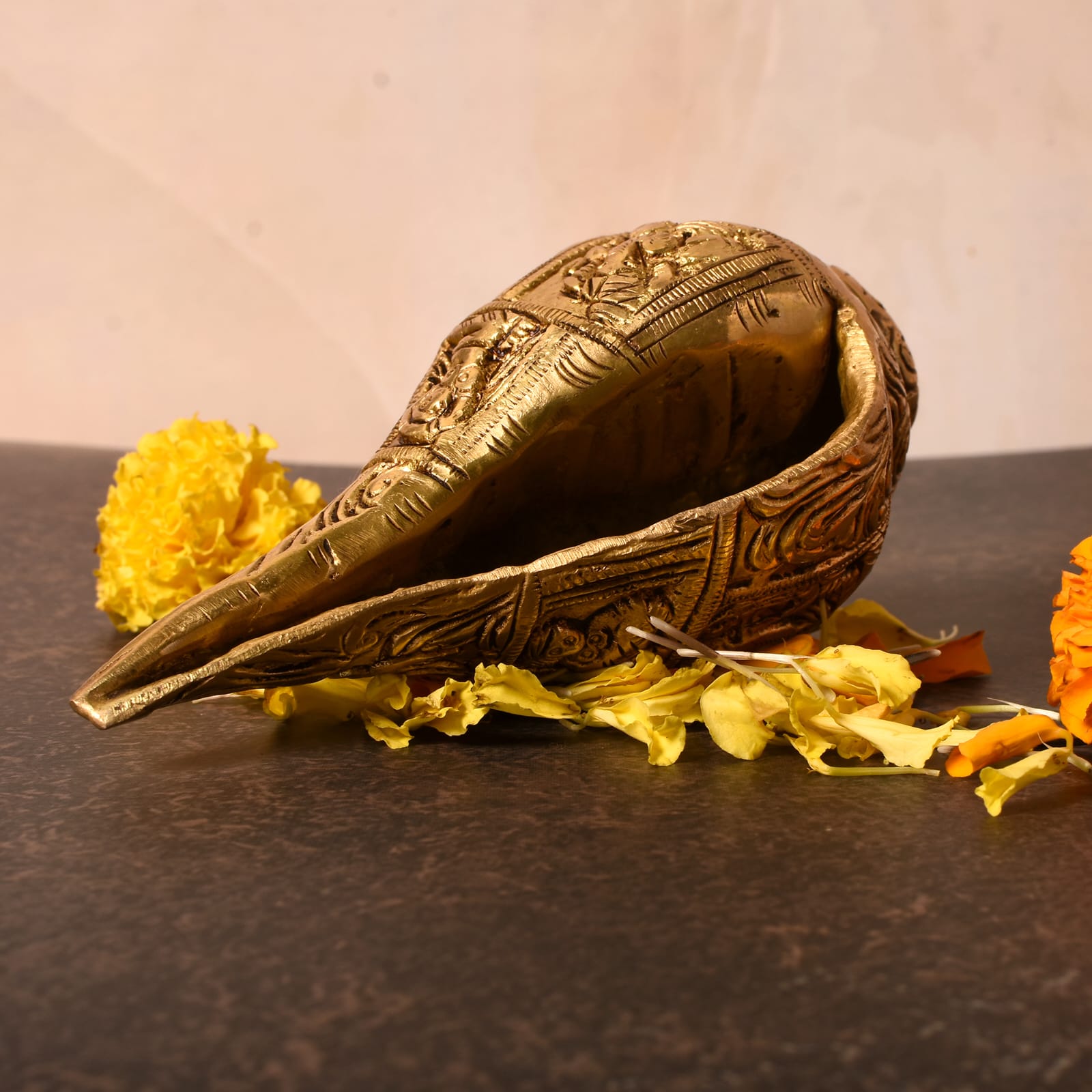 "Handcrafted Brass Shankh with Intricate Carvings – Decorative Sacred Conch Shell"
