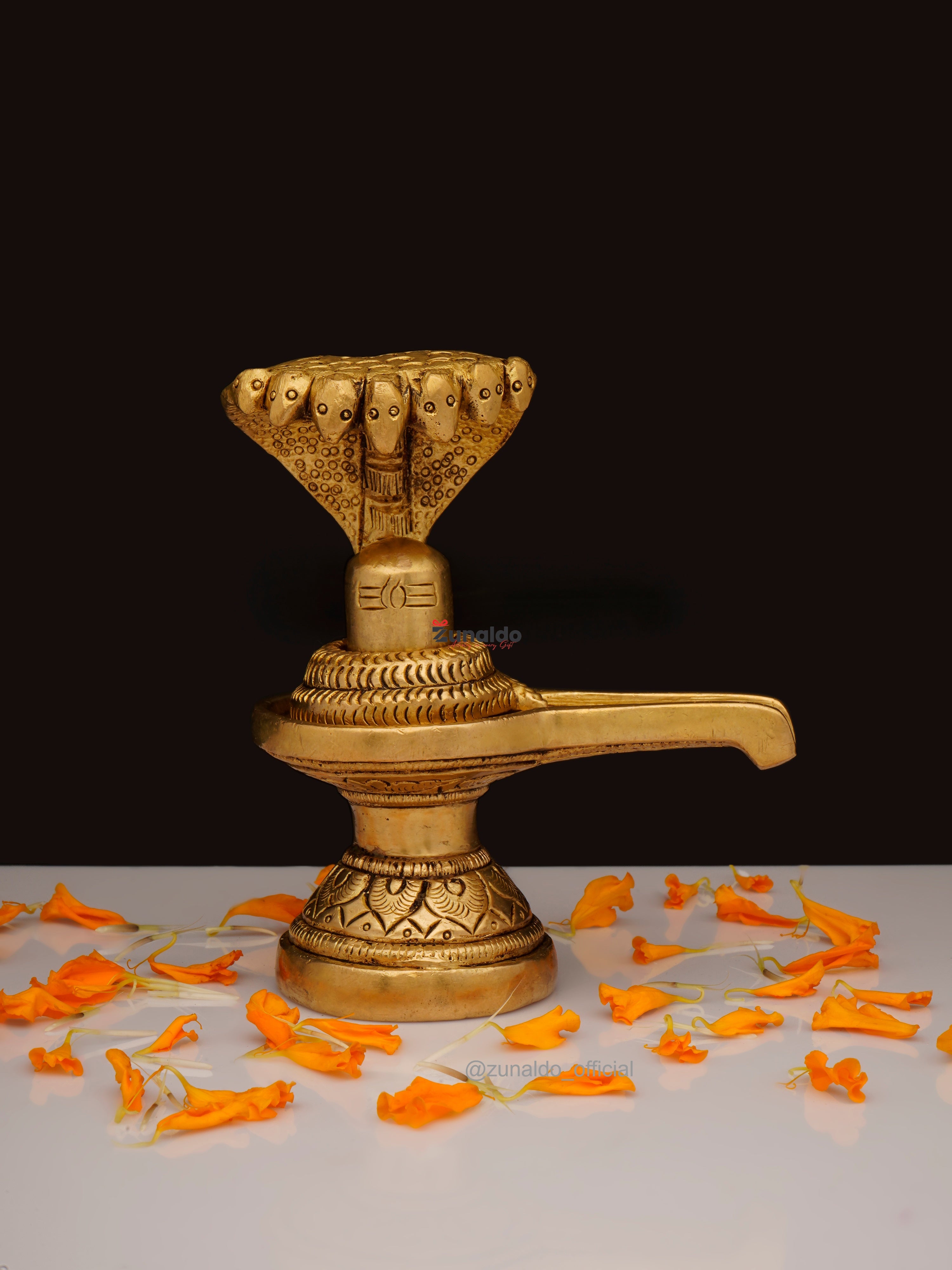 Brass Shivling with Cobra & Carved Base - 4 Inch