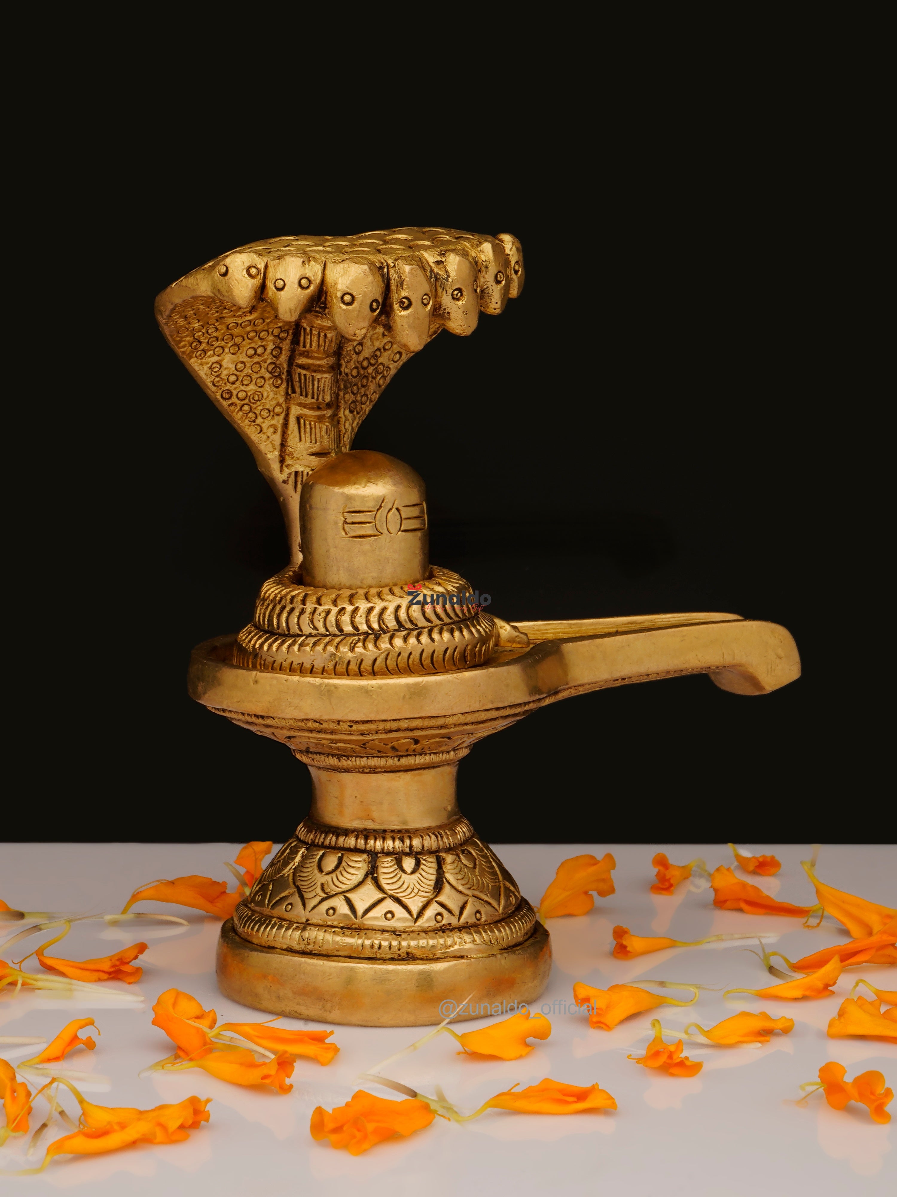 Brass Shivling with Cobra & Carved Base - 4 Inch