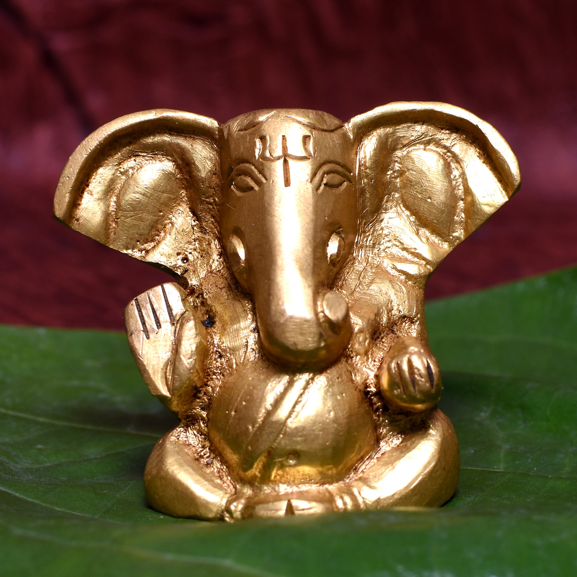 Golden Lord Ganesha Idol – Miniature Decorative Statue for Home & Puja