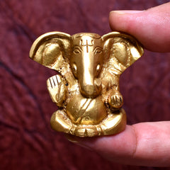 Golden Lord Ganesha Idol – Miniature Decorative Statue for Home & Puja