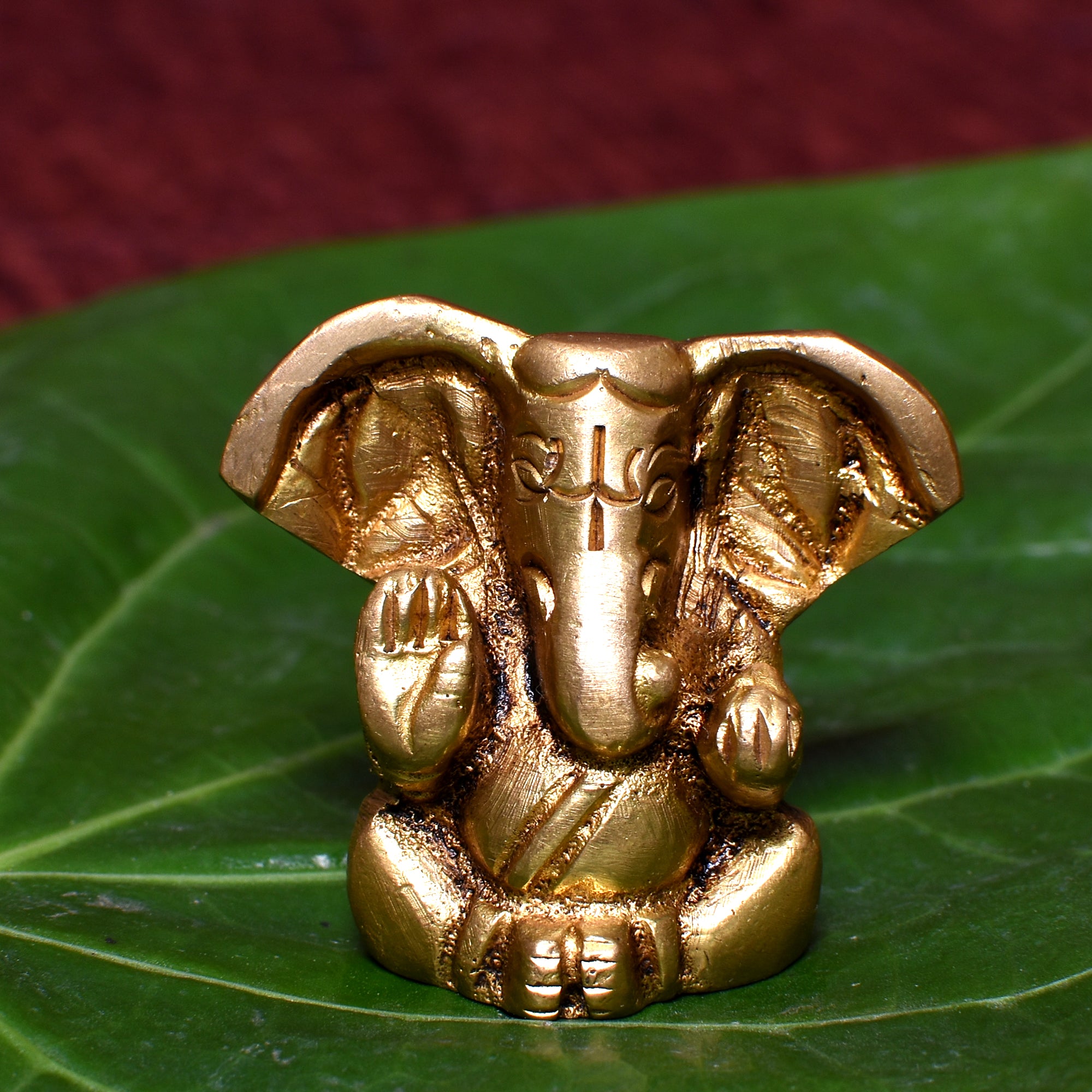Golden Lord Ganesha Idol – Miniature Decorative Statue for Home & Puja