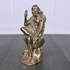 Brass Sai Baba Sitting on Rock 5 Inch